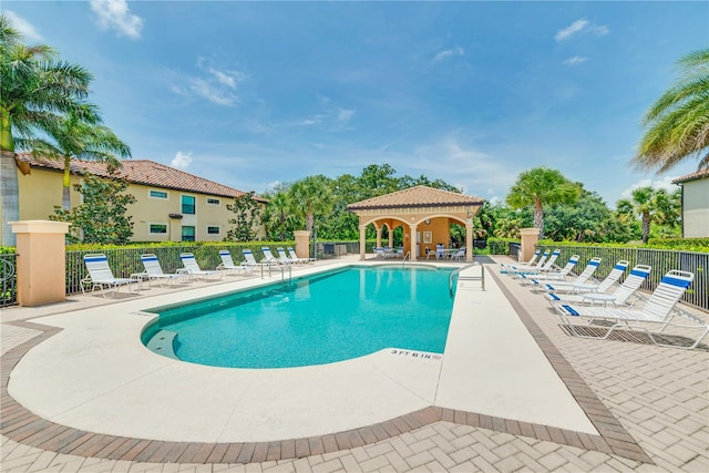 view of pool featuring a gazebo and a patio area