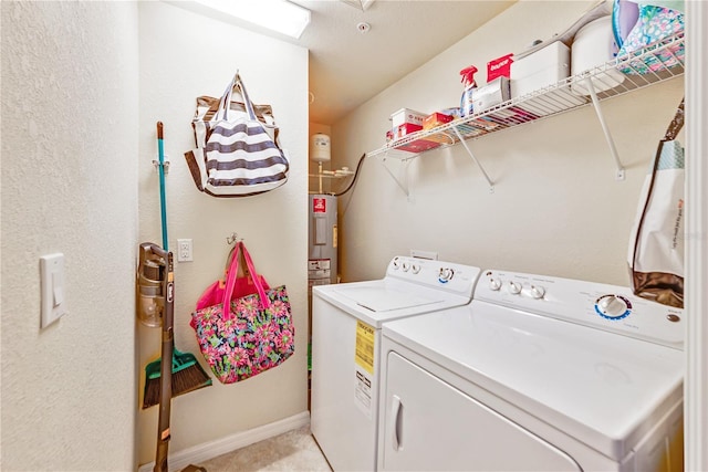 laundry area featuring independent washer and dryer and electric water heater