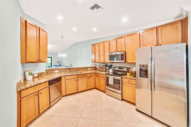 kitchen with visible vents, appliances with stainless steel finishes, a sink, light stone countertops, and a peninsula