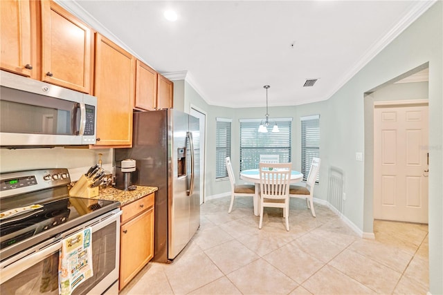 kitchen featuring visible vents, appliances with stainless steel finishes, ornamental molding, pendant lighting, and light tile patterned flooring