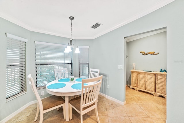 dining area with visible vents, light tile patterned floors, baseboards, a chandelier, and ornamental molding