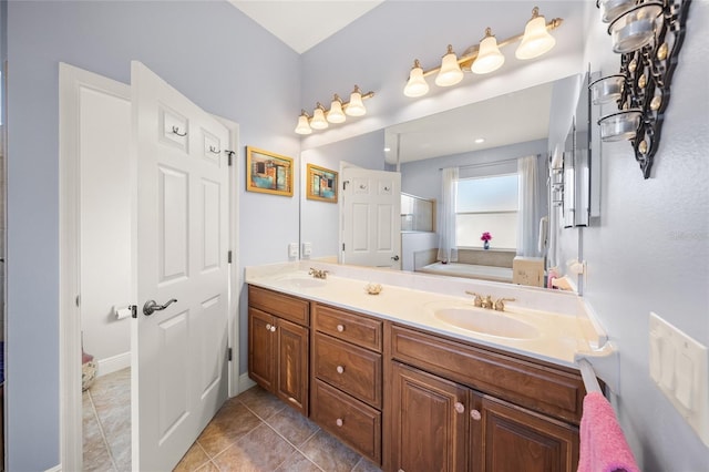 bathroom with tile patterned floors, shower with separate bathtub, and vanity