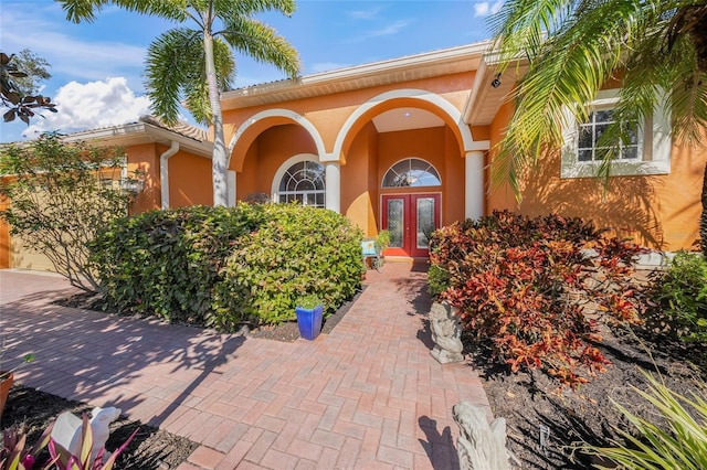 entrance to property featuring french doors