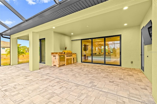 view of patio / terrace with exterior kitchen and area for grilling