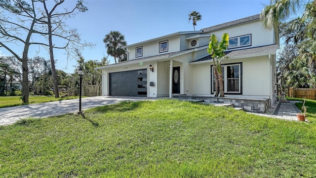 view of front facade featuring a garage and a front yard