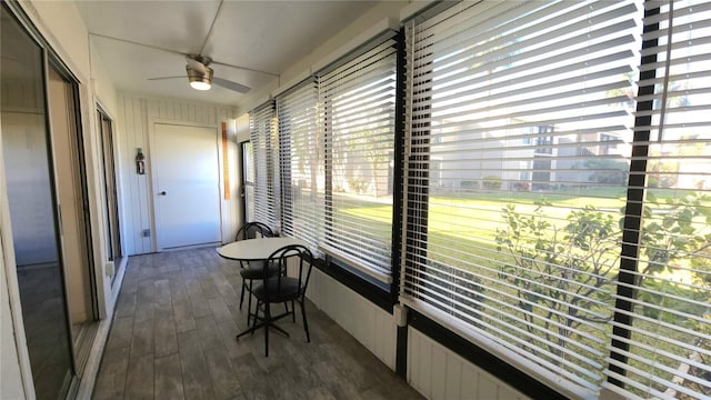 sunroom / solarium with ceiling fan