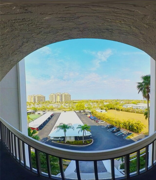 balcony featuring a city view