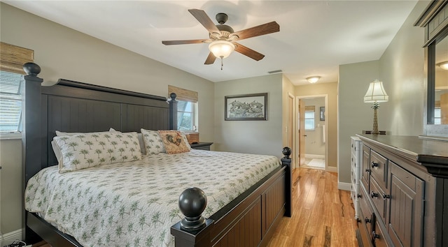 bedroom featuring light hardwood / wood-style floors and ceiling fan