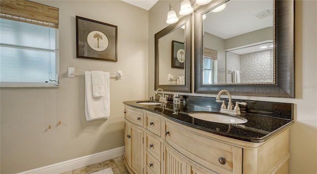 bathroom featuring vanity and tile patterned floors