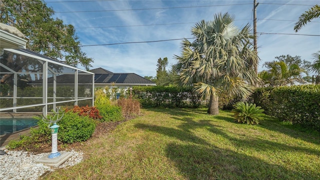 view of yard featuring a lanai