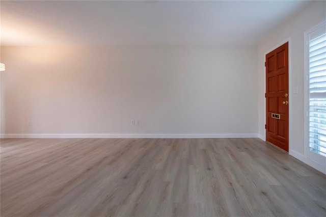 empty room featuring light hardwood / wood-style floors