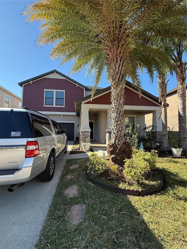 view of front of property featuring a garage