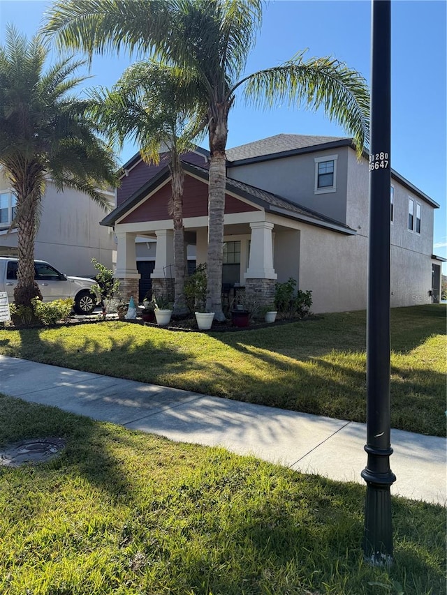 view of front of home with a front yard