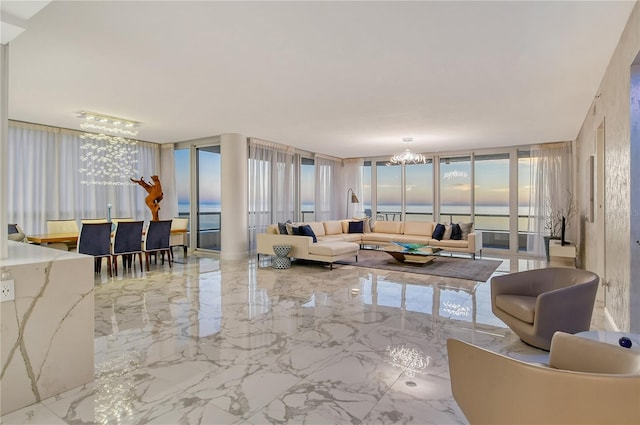 living room with an inviting chandelier and expansive windows