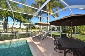 view of pool with a lanai and a patio area