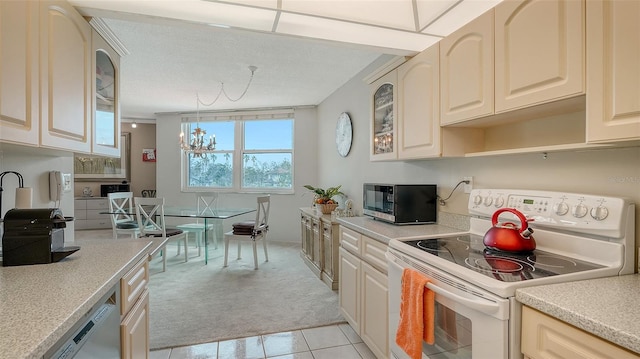 kitchen with a textured ceiling, dishwasher, light carpet, white range with electric cooktop, and cream cabinets