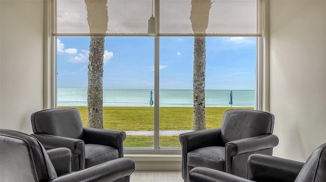 living area with a water view