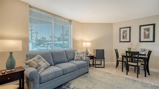 living room with light hardwood / wood-style floors