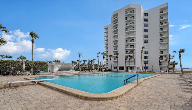 view of pool featuring a patio