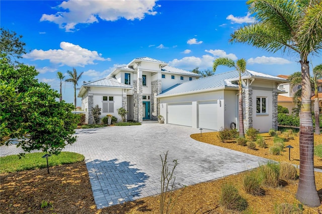 view of front of home with a garage