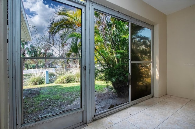 entryway featuring light tile patterned floors