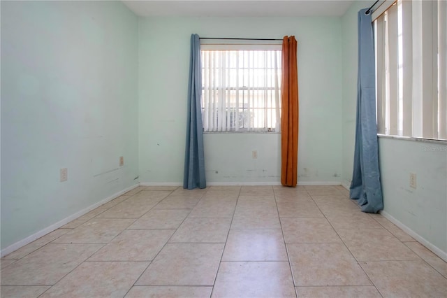 view of tiled spare room