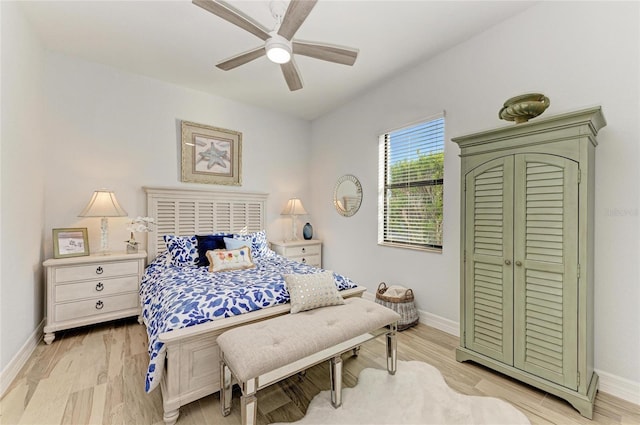 bedroom featuring ceiling fan and light wood-type flooring