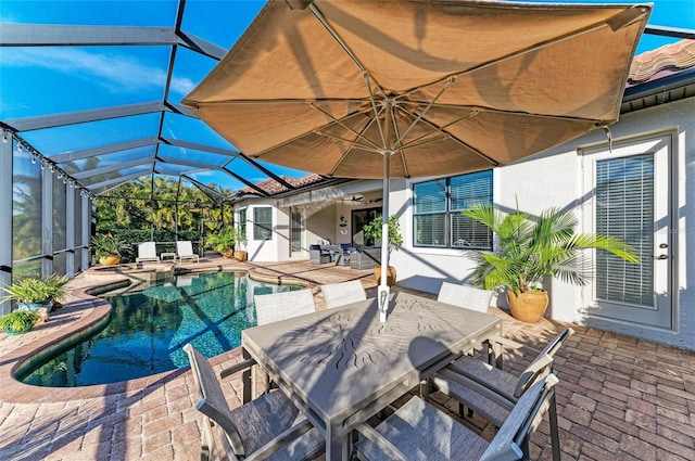 view of pool featuring a patio and a lanai