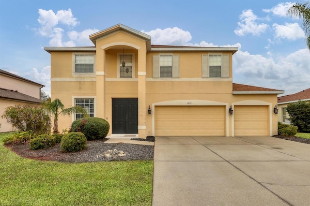 view of front of property with a garage