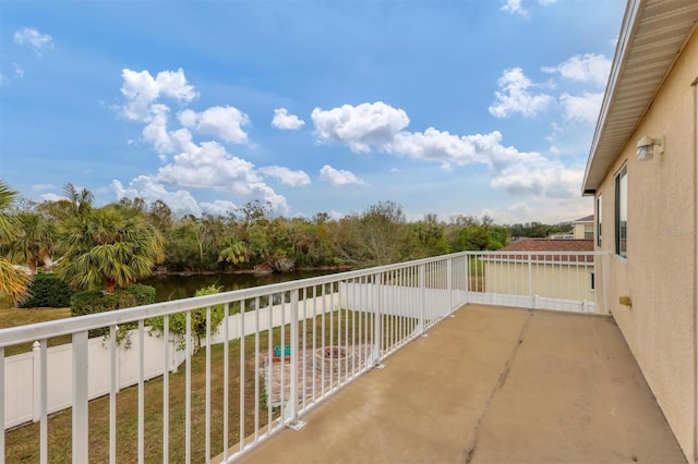 balcony featuring a water view