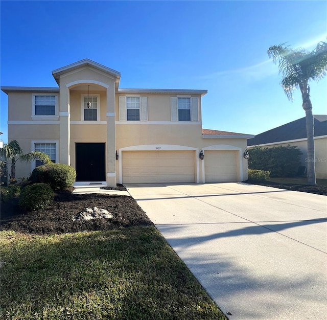 view of front of property with a garage