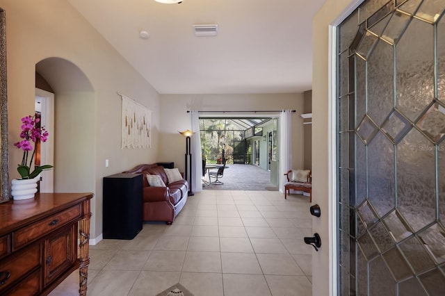 foyer entrance featuring light tile patterned flooring