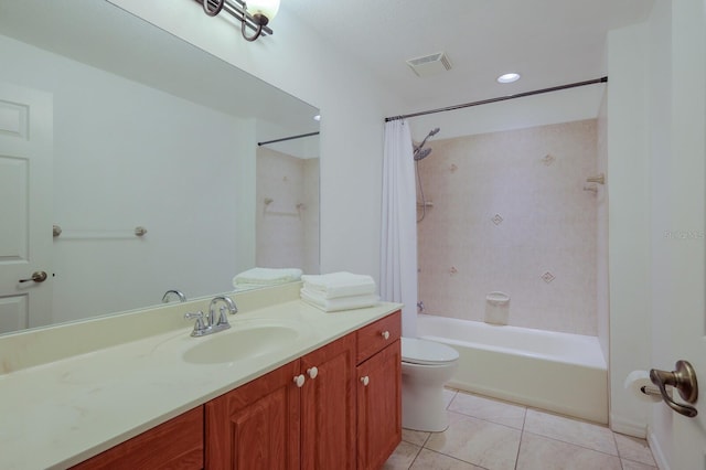 full bathroom featuring shower / tub combo, vanity, toilet, and tile patterned flooring