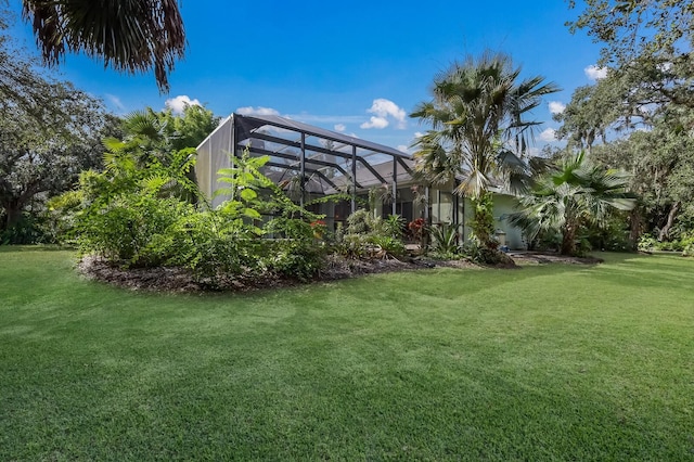 view of yard featuring a lanai