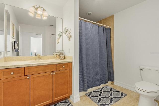 bathroom featuring tile patterned floors, toilet, a shower with shower curtain, and vanity