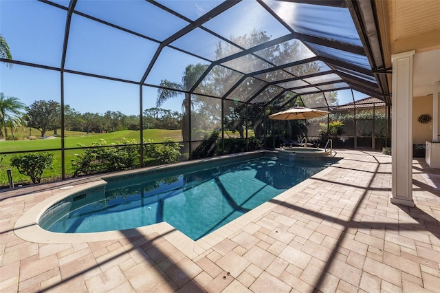 view of swimming pool with an in ground hot tub, a lanai, and a patio