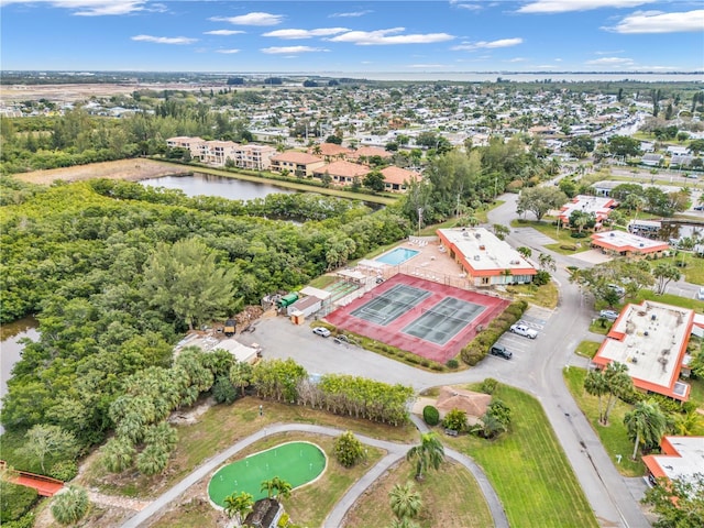 bird's eye view with a water view