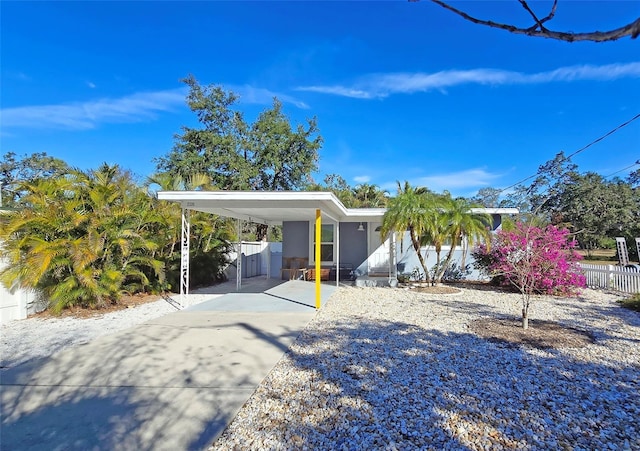 view of front of house featuring a carport