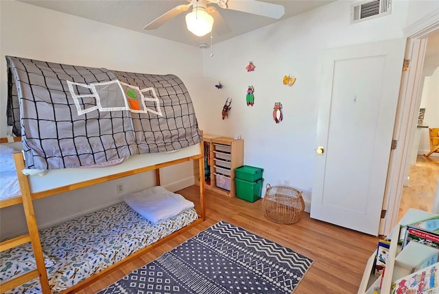 bedroom with light hardwood / wood-style floors