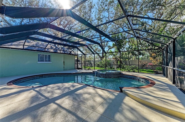 view of swimming pool with a lanai, a patio, and an in ground hot tub