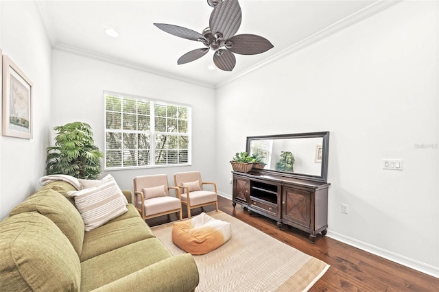 living room featuring ceiling fan, crown molding, and dark hardwood / wood-style floors