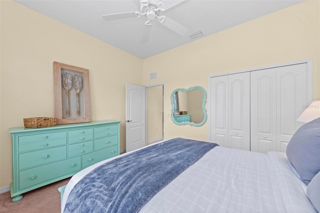 bedroom featuring carpet, a closet, and ceiling fan