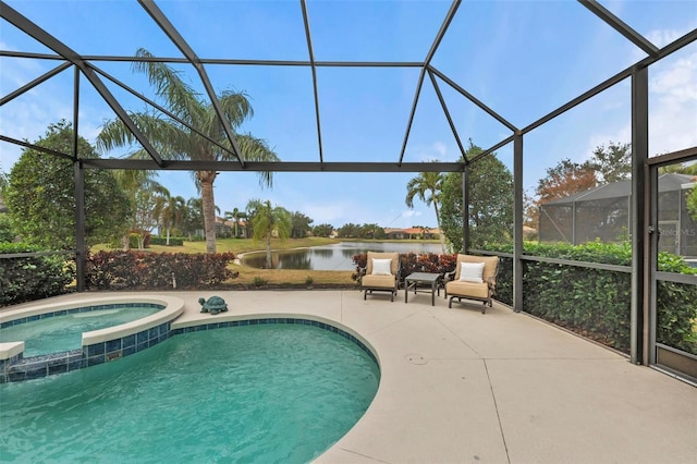 view of pool featuring glass enclosure, an in ground hot tub, a water view, and a patio area