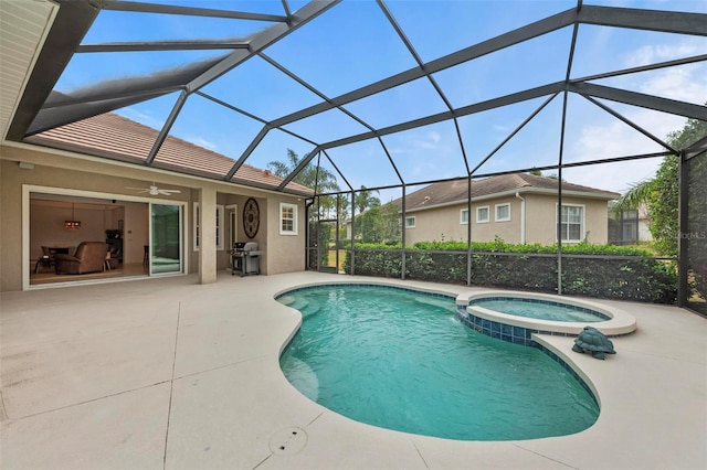 view of swimming pool featuring an in ground hot tub, a lanai, grilling area, and a patio