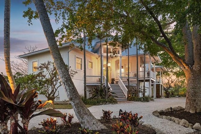 view of front of property featuring covered porch