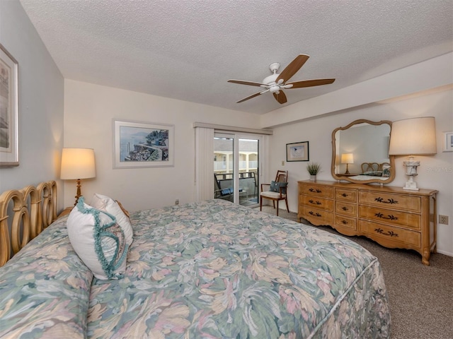 carpeted bedroom with a textured ceiling, ceiling fan, and access to outside