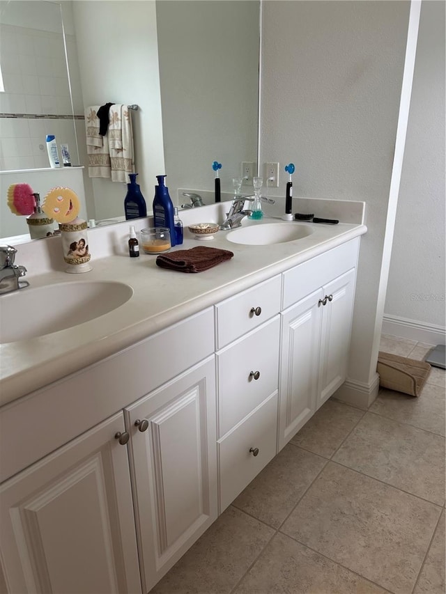 bathroom featuring vanity and tile patterned floors