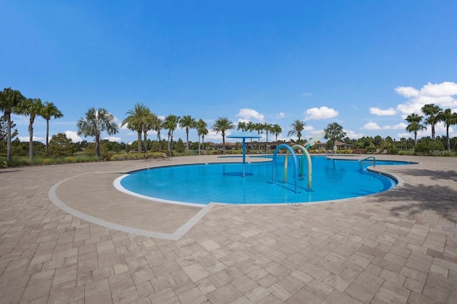 pool with a patio area