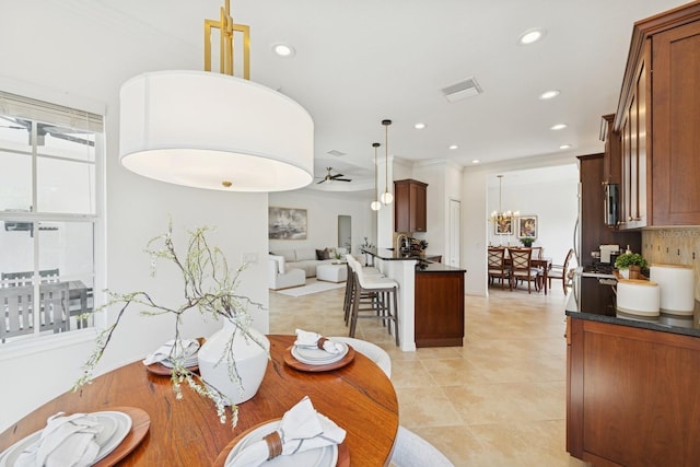 dining room featuring ceiling fan, visible vents, recessed lighting, and light tile patterned floors