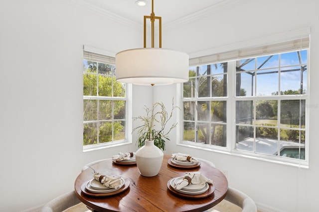 dining room with crown molding